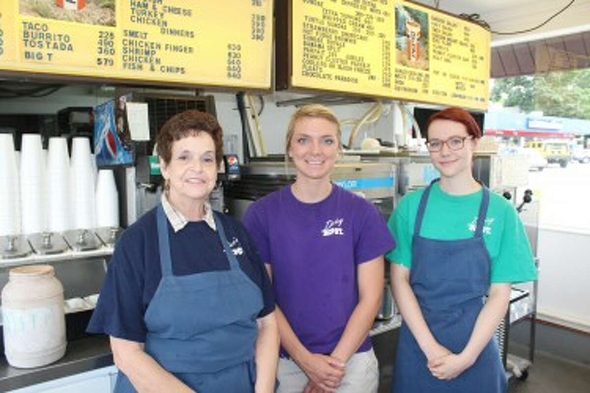 DEPOT CREW: The Dairy Depot offers a wide range of food and ice cream favorites. Pictured (from left) are employees Sandy Stump, Nicole McDonald and Mary Cooper. Stump has worked at the Depot for more than 30 years. (Herald Review photo/Sarah Neubecker)