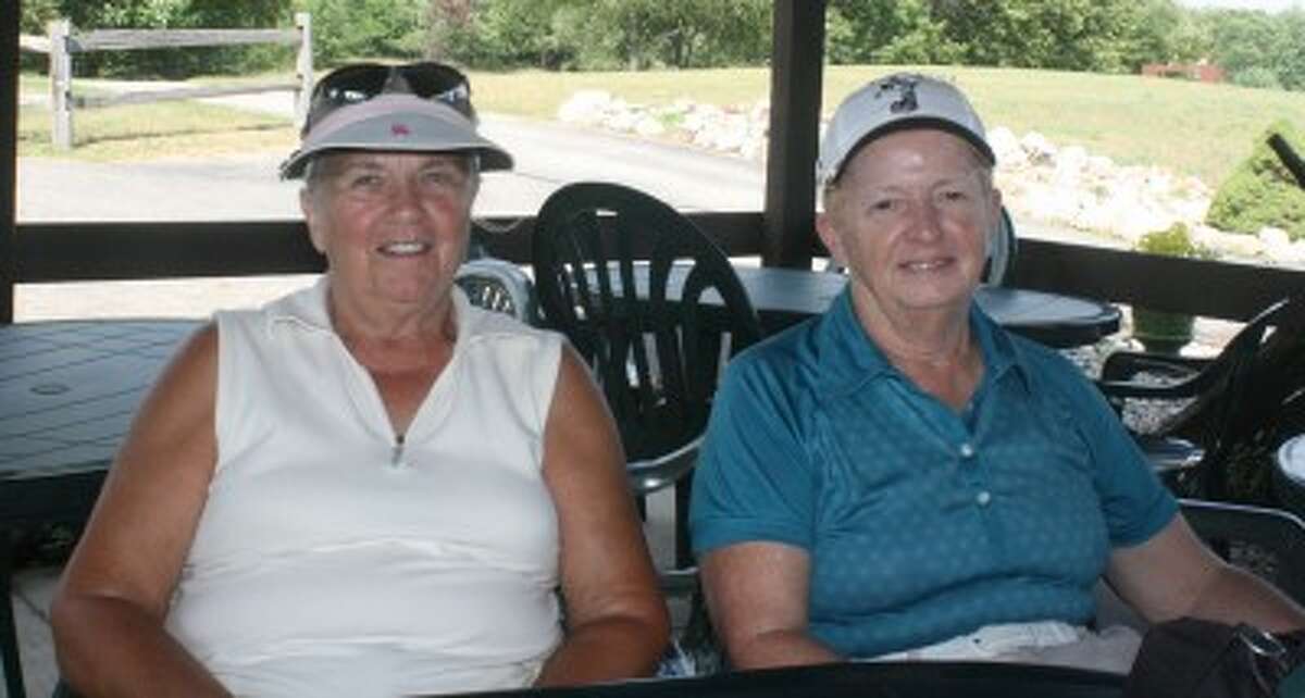 AT THE TURN: Joan Foote (left) and Susan Staton get ready for a round of golf at Spring Valley. (Pioneer photo/John Raffel)