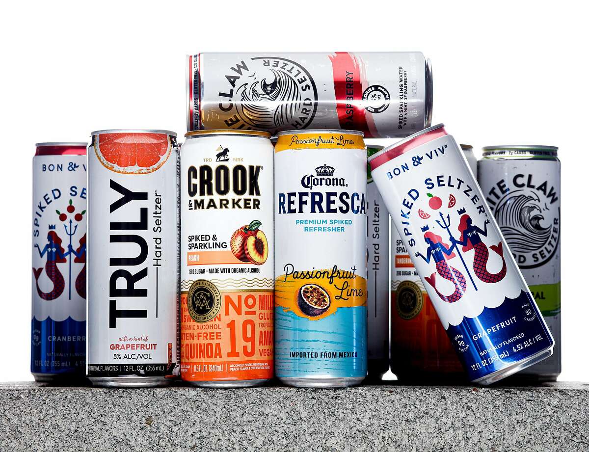 Cans of hard seltzer from Truly, Crook and Marker, Corona Refresca, Bon and Viv, and White Claw are seen on Tuesday, Aug. 13, 2019 in San Francisco, Calif. Hard seltzers were the drink trend of 2019.