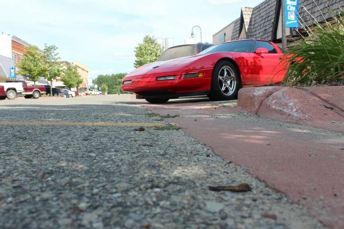 NEW LOCATION: Upton Avenue will be closed from Chestnut to Higbee streets Saturday for the eighth annual Crossroads Car Show. Event-goers are encouraged to bring a donation of a nonperishable food item for the Reed City Ministerial Association Food Pantry. (Herald Review photos/Sarah Neubecker)