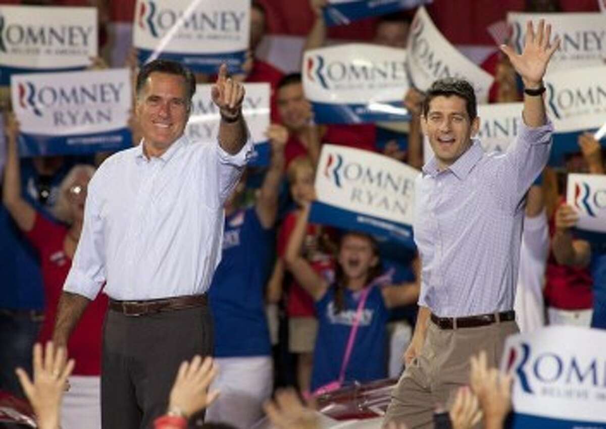 MITT’S VICE: Republican presidential nominee Mitt Romney accompanied by running mate Paul Ryan.