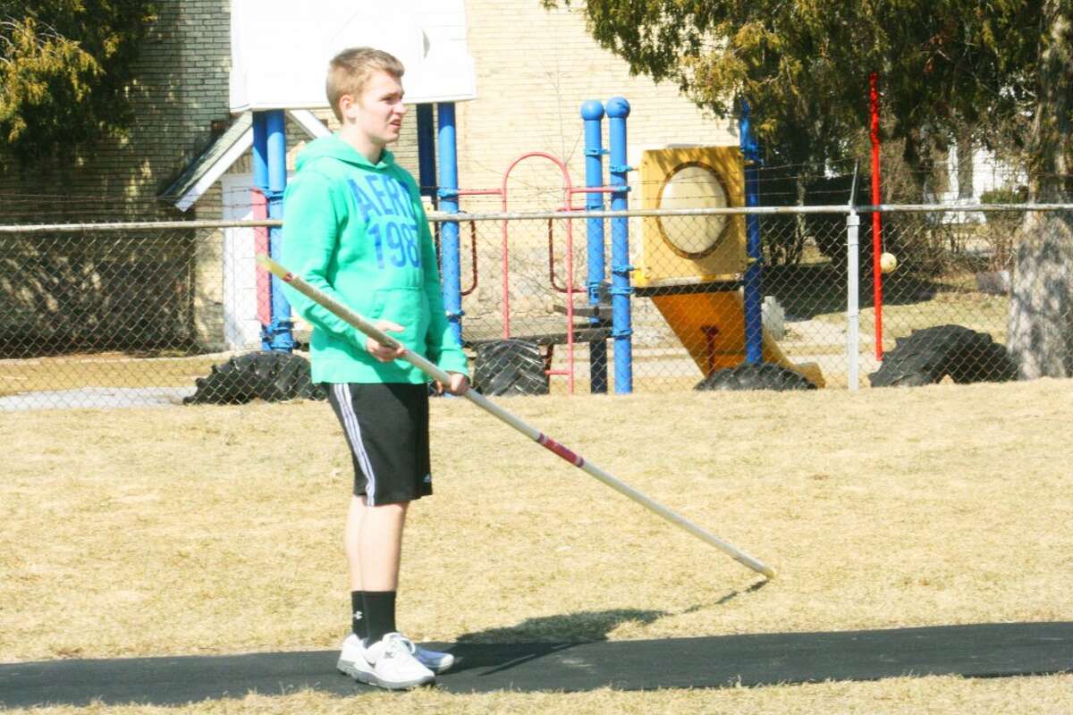 POLE VAULT: Dylan Langlois gets ready to practice the pole vault. (Herald Review/John Raffel)