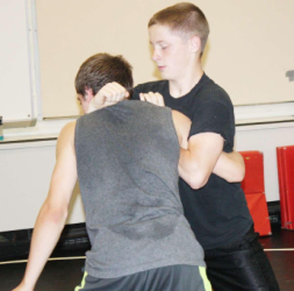 staying in form: Matt Magahey works on Brendan Marsh during a Reed City wrestling practice last week. (Herald Review/John Raffel)