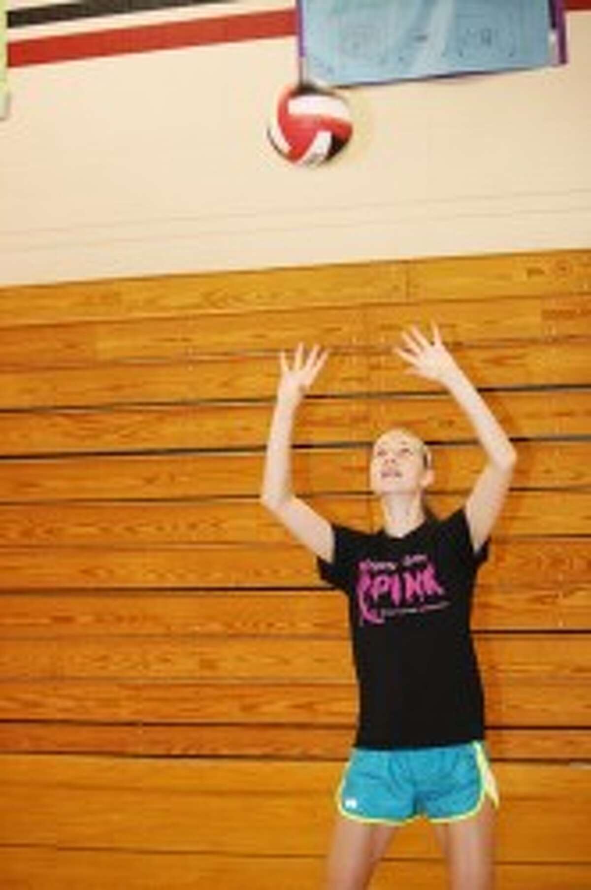 SET IT UP: Reed City's Alison Schermerhorn works on her setting during a recent practice over the summer. (Pioneer photo/John Raffel)