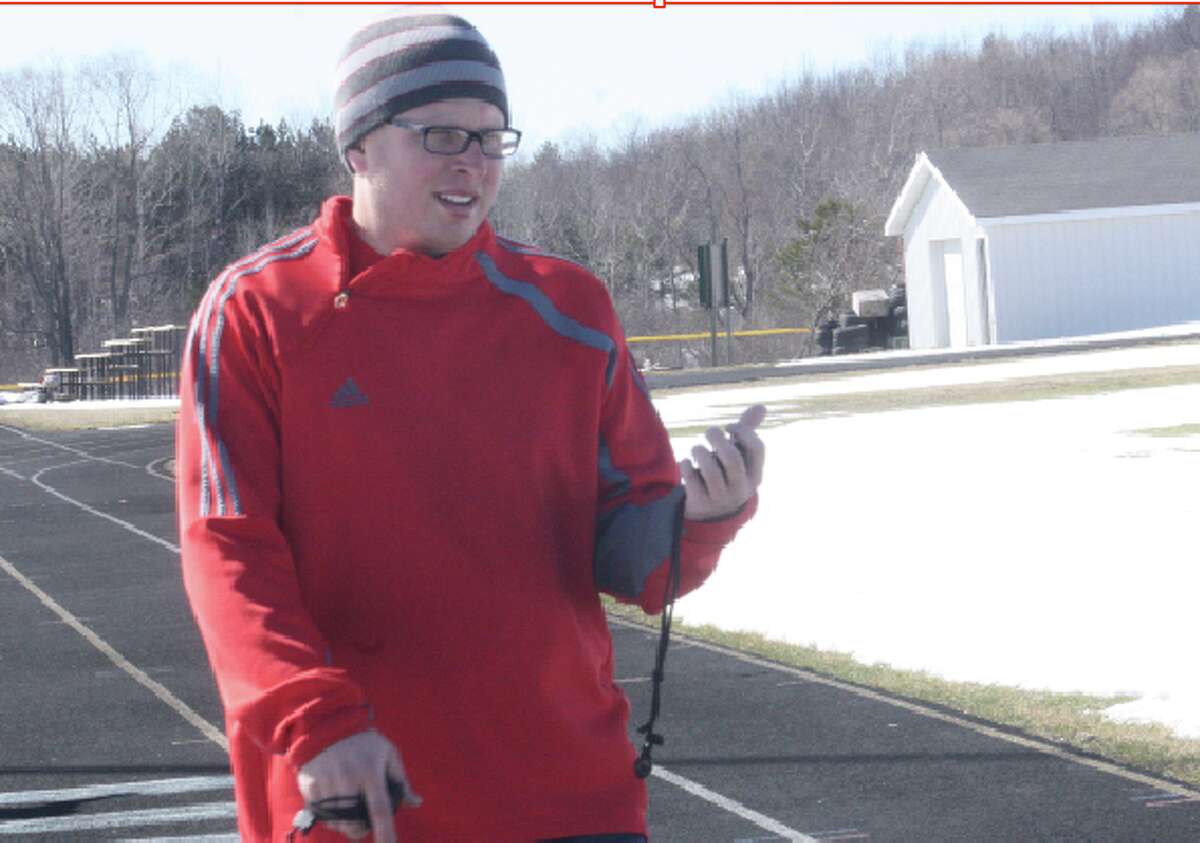 Early practice: Scott Gebhard of Pine River started the track season in early April, conducting practices during wintry conditions. (File photo)