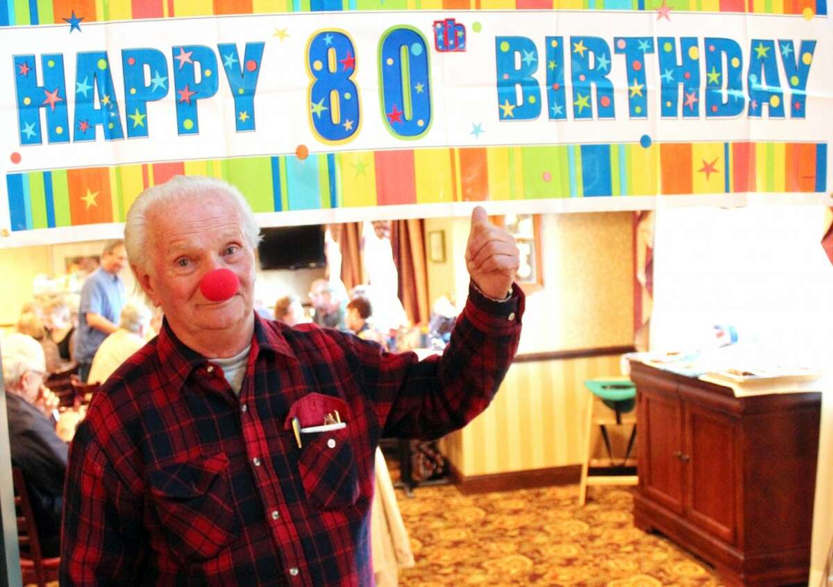OCTOGENARIAN: Rudy Grahek, who plays Dynamite the Clown, celebrated his 80th birthday on Saturday. Family and friends organized a surprise party for the performer at the Comfort Inn and Suites in Big Rapids. (Herald Review photo/Sarah Neubecker)