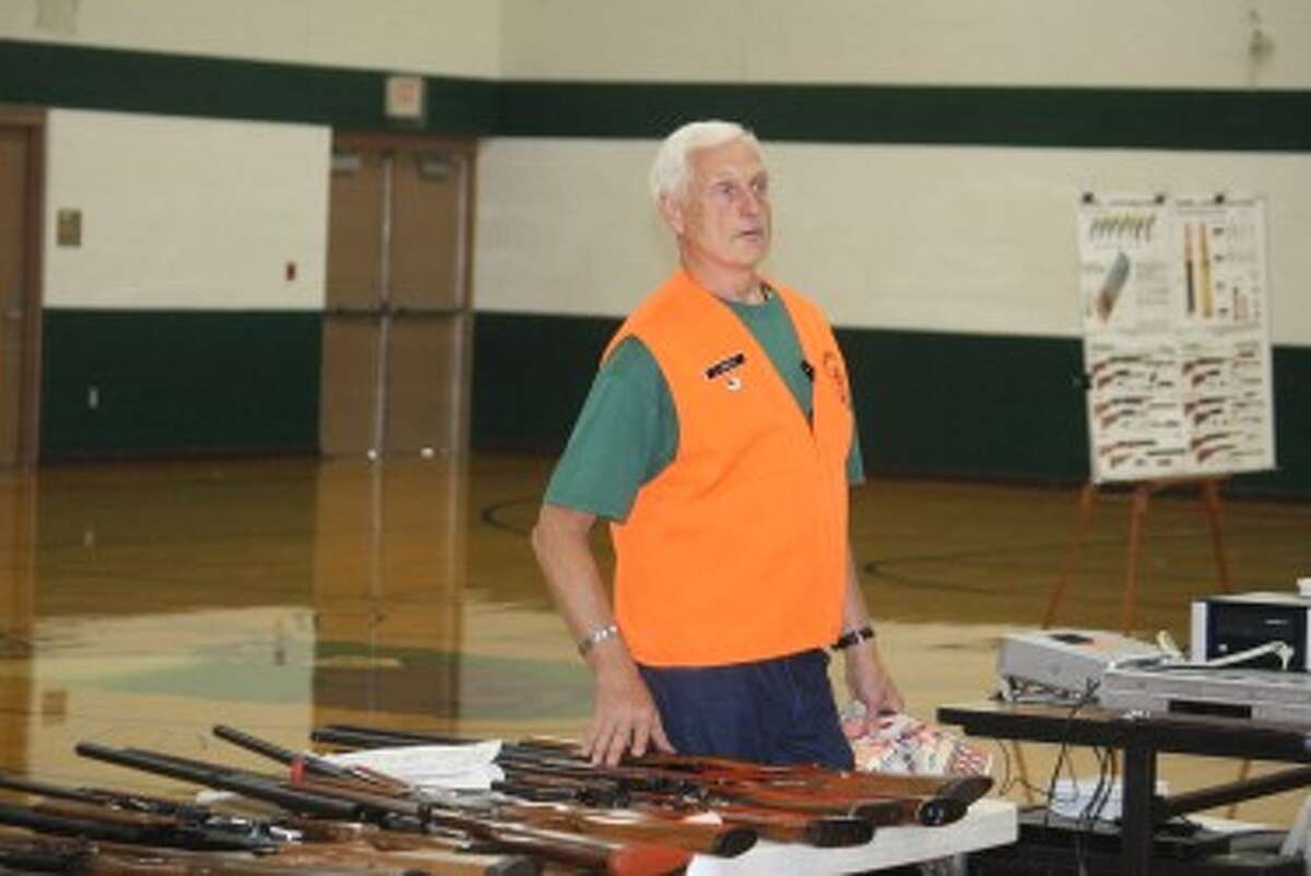 SAFETY FIRST: Larry Copley covers hunter safety topic areas with his class at Pine River Middle School on Saturday. (Herald Review photo/John Raffel)