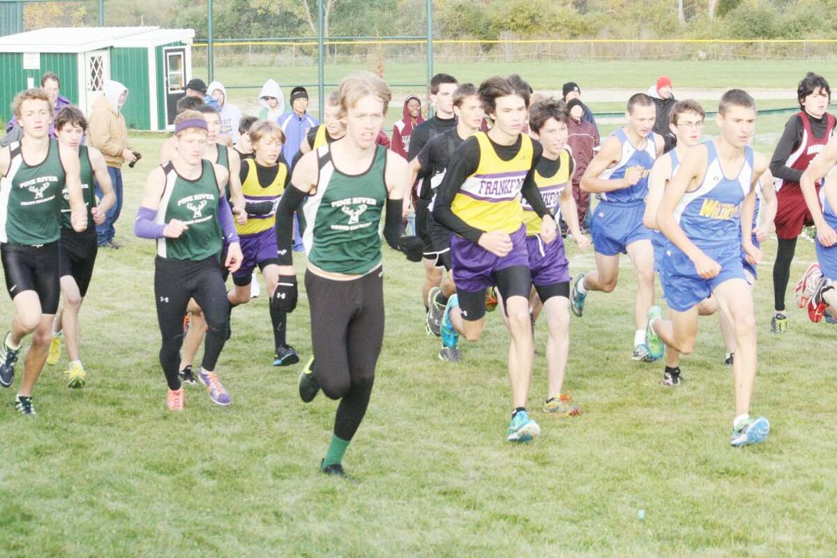 AND THEY'RE OFF: Pine River and Evart runners get off to a flying start during the Pine River Invitational. (Herald Review photo/John Raffel)