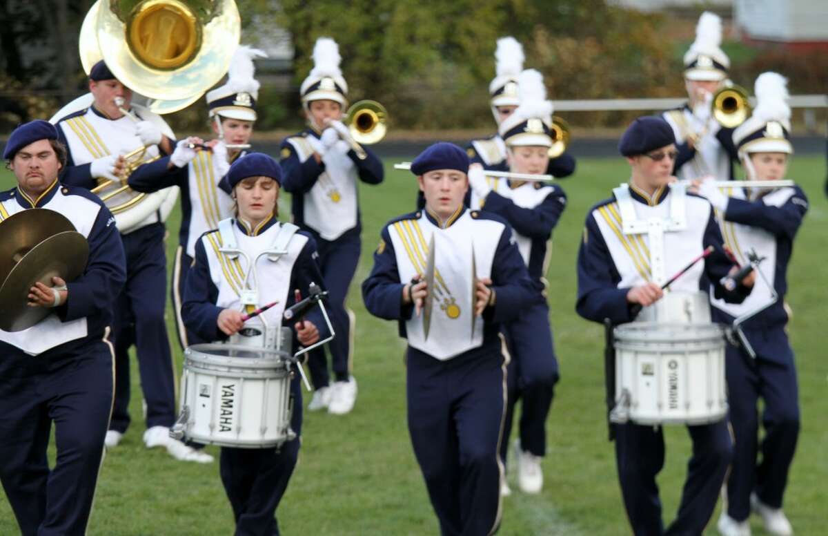 GETTING FUNKY: Evart High School’s marching band chose a “funk” theme for its festival performance on Wednesday. (Herald Review photos/Lauren Fitch)
