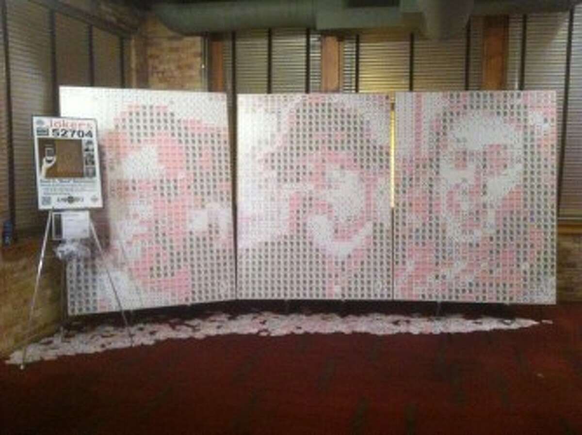 CREATION: “Jokers” is made of three 80-inch portraits composed of 2,307 playing cards arranged to create human faces. Pine River art teacher Scott Buckmaster used the piece as a way to encourage students to take their own art to the next level. (Courtesy photo)