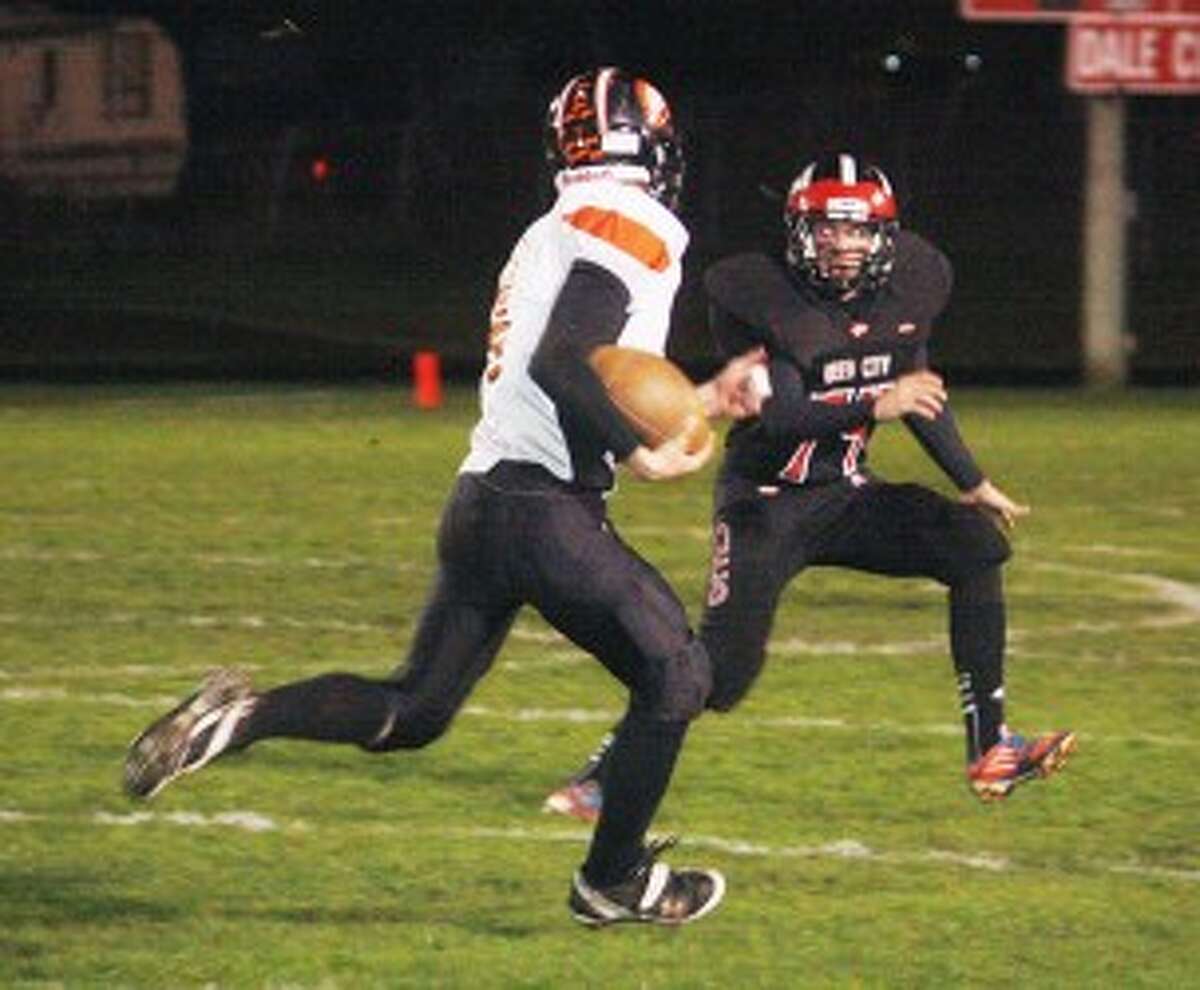 STAY WITH IT: Reed City's Ricky Droke comes up to make a tackle against White Cloud on Friday. (Herald Review photo/John Raffel)