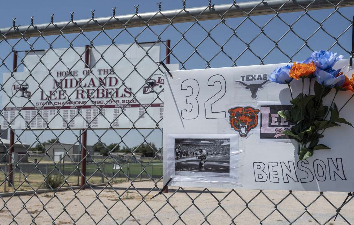 A small memorial for Cedric Benson is on the fence 08/19/19 outside the Lee High School track and football practice field. Tim Fischer/Reporter-Telegram