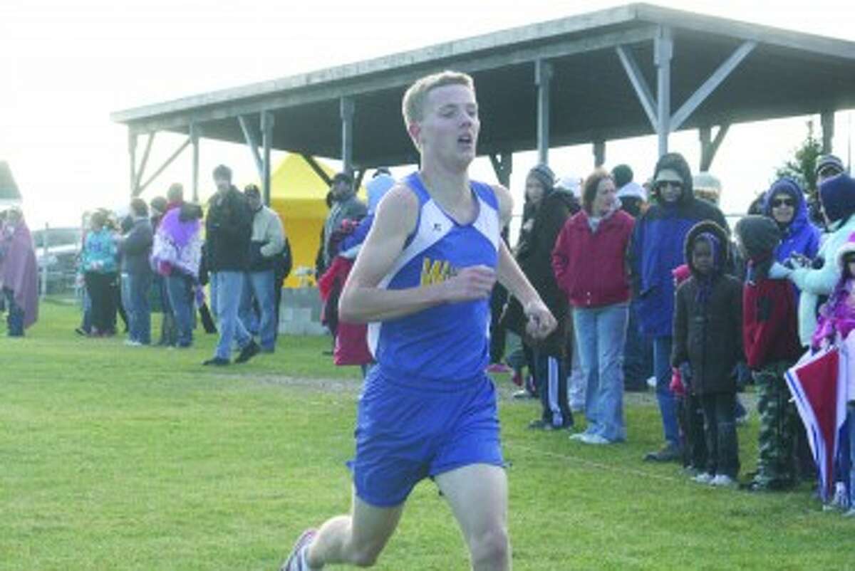 ENDING STRONG: David Zinger of Evart will run his last high school cross country race Saturday in the state finals. (File photo)