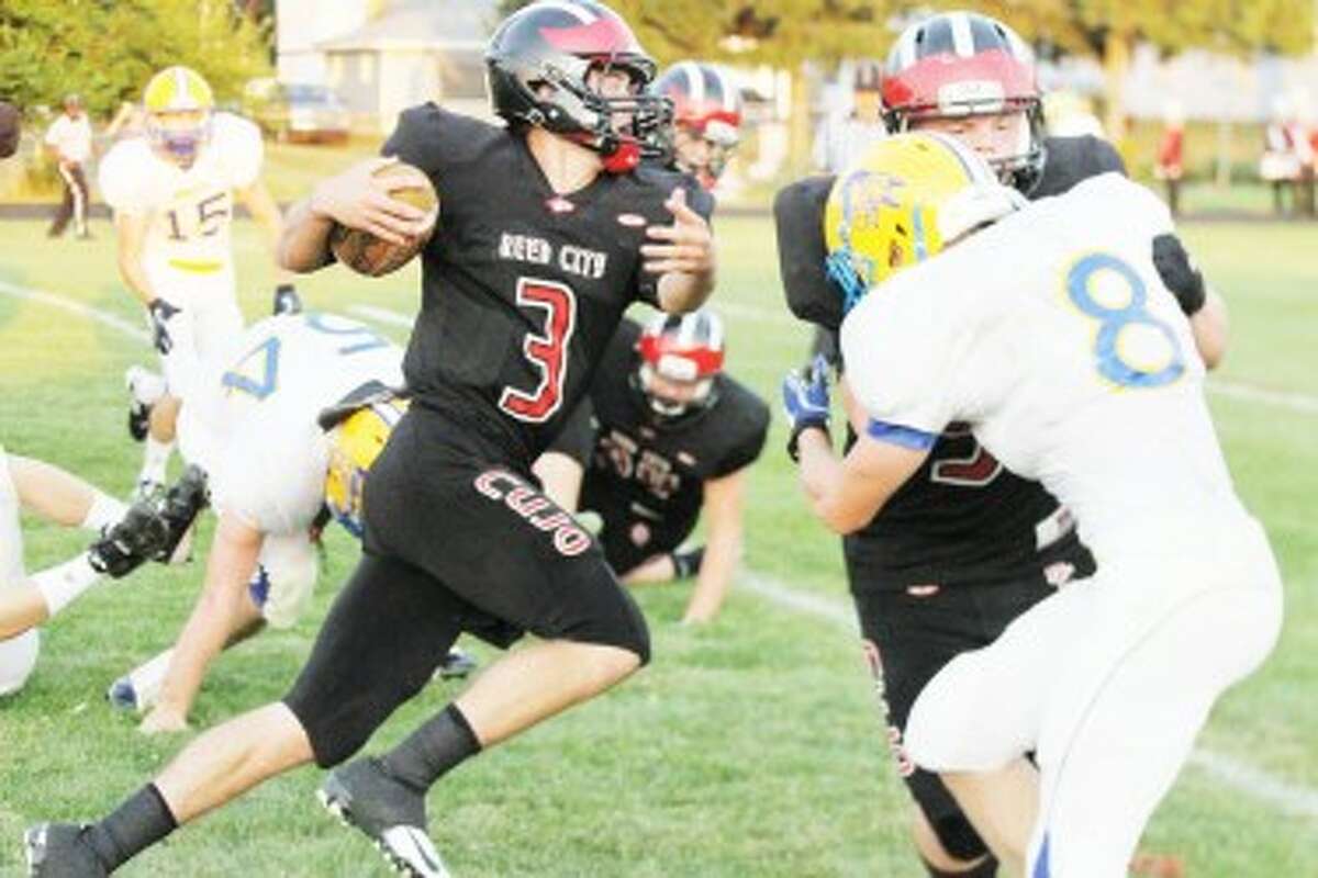 MAKING A RUN: Reed City is one of three area teams looking to claim their first district football title on Friday. (Herald Review file photo)