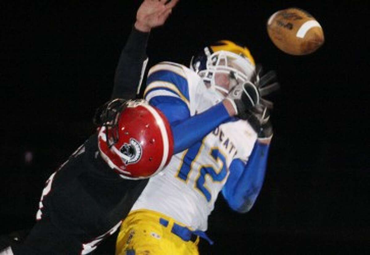 ALMOST THERE: Evart's Jacob Hopkins juggles a ball that is up for grabs during Friday's district final against Lake City. (Pioneer photo/John Raffel)