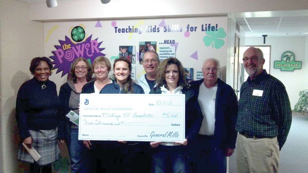 COMMUNITY SUPPORT: Local organizations were grateful for the donations they received from the General Mills Yoplait foundation. The foundation donated a total of $130,000 to the various local organizations. (Courtesy photos)