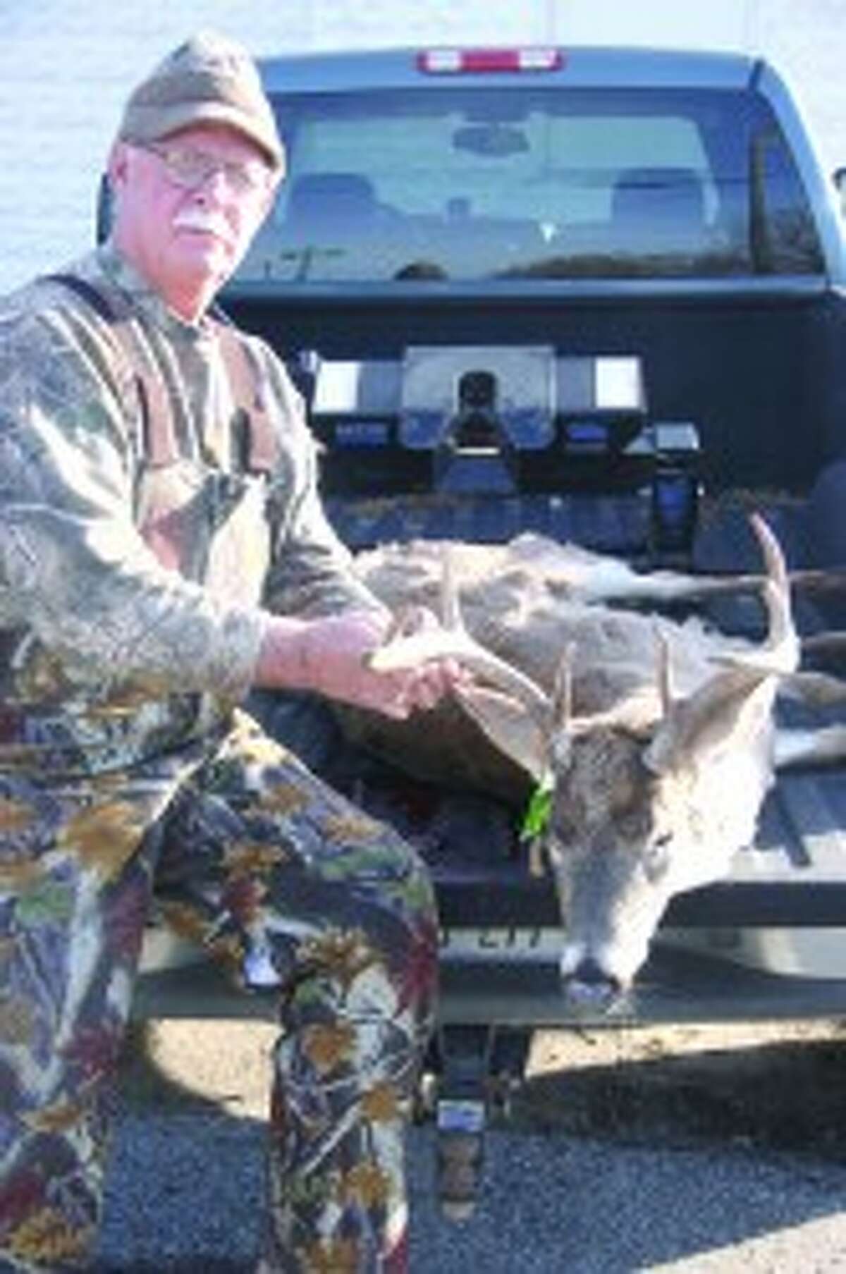 BIG BUCK: First Place honors in the 2011 Evart Big Buck Contest went to David Hubbard who shot a beautiful 9 point buck with a spread of 18 1/2 inches in the Emerald Lake area. (Herald Review file photo)