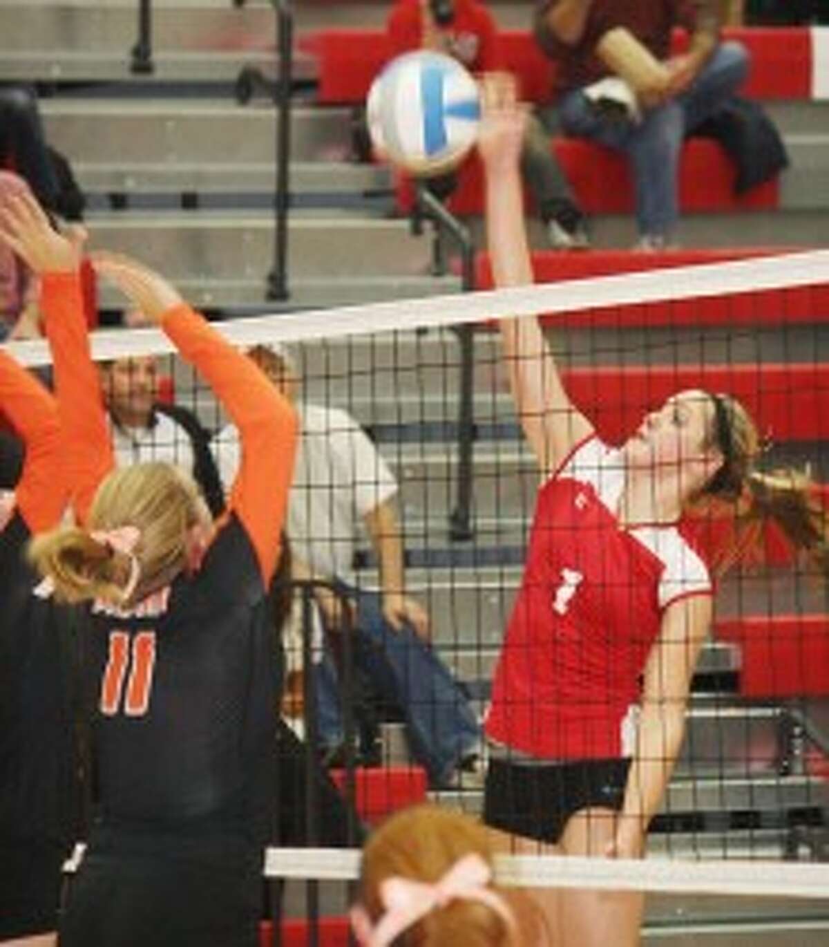 MOVING ON: Reed City's volleyball team advanced to Thursday's regional final with a 3-0 win over Belding on Tuesday. (Herald Review photo/John Raffel)