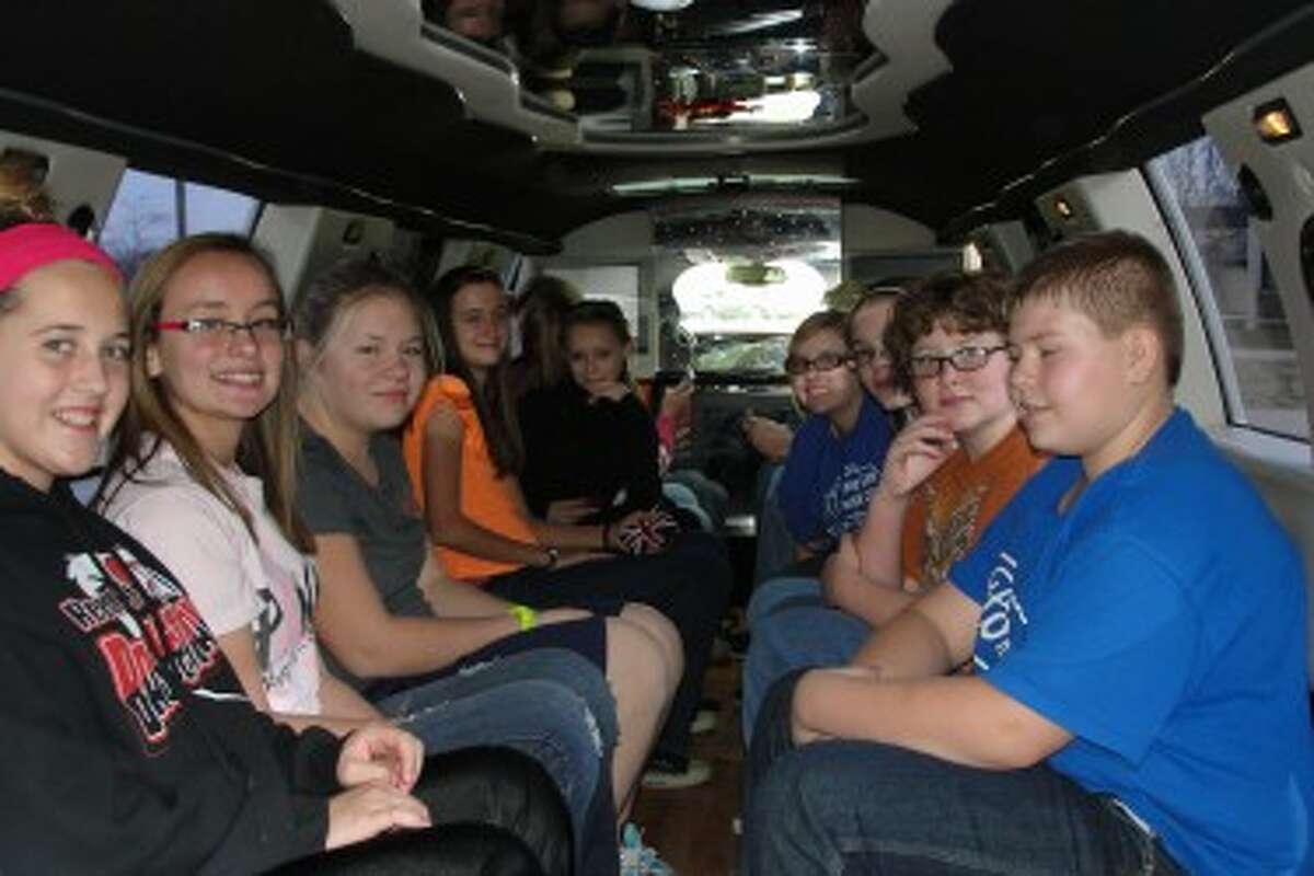 RIDING IN STYLE: Students were smiling with excitement as they see the inside of a limousine for the first time.