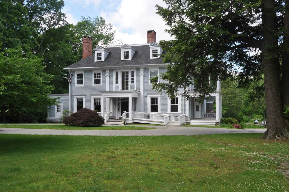 South Hall of St. Stephen's Church is a three story house with a semi-circular driveway in front of it. Church leaders are exploring a possible sale of the building.