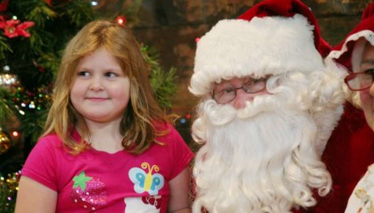 MEETING SANTA: Young and old friends had a chance to meet with Saint Nick during Christmas in a Smalltown celebrations