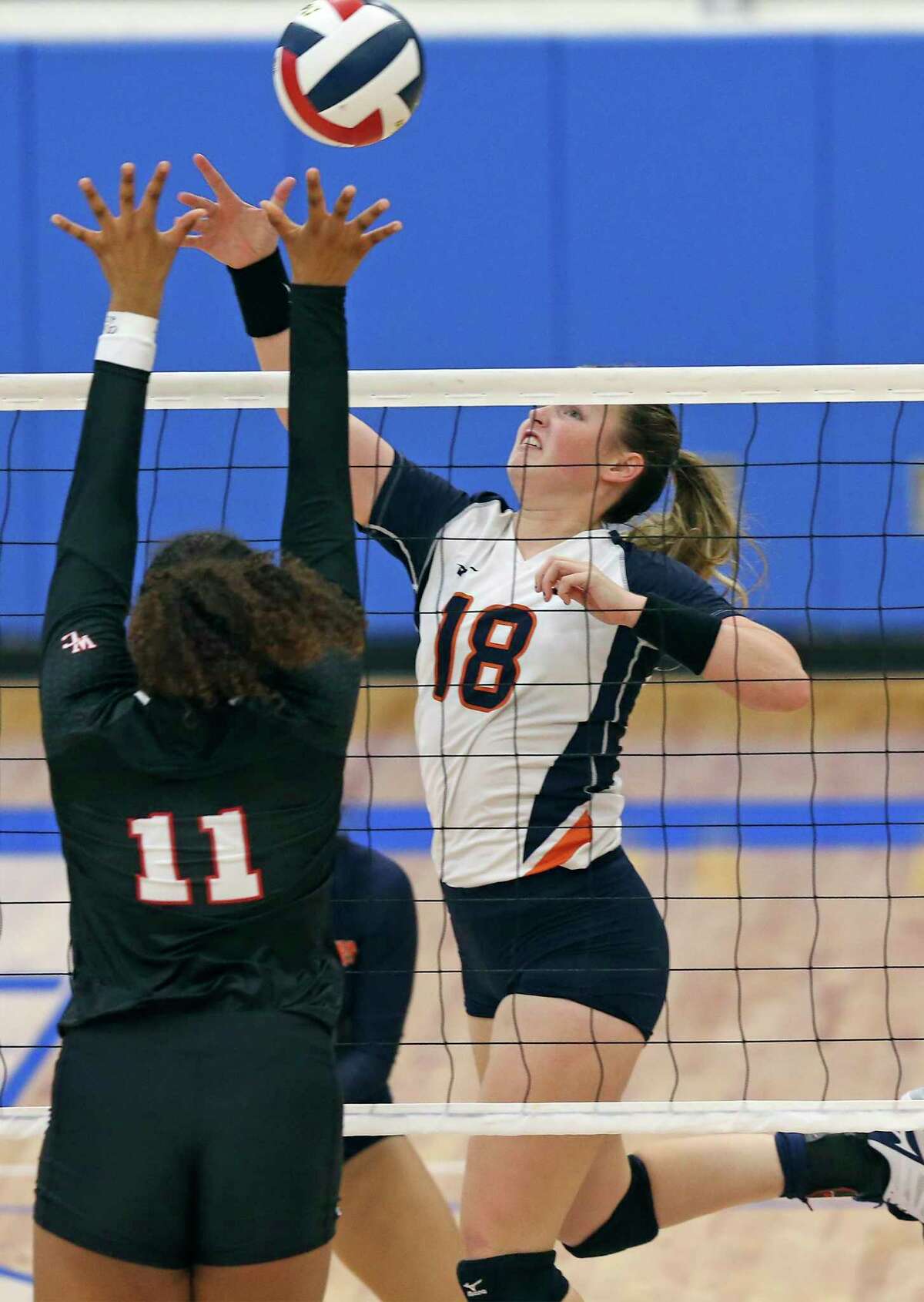 Selby Draker flips the ball for the Broncos as Brandeis hosts Churchill in the season opening volleyball match at Northside Sports Gym on August 6, 2019.