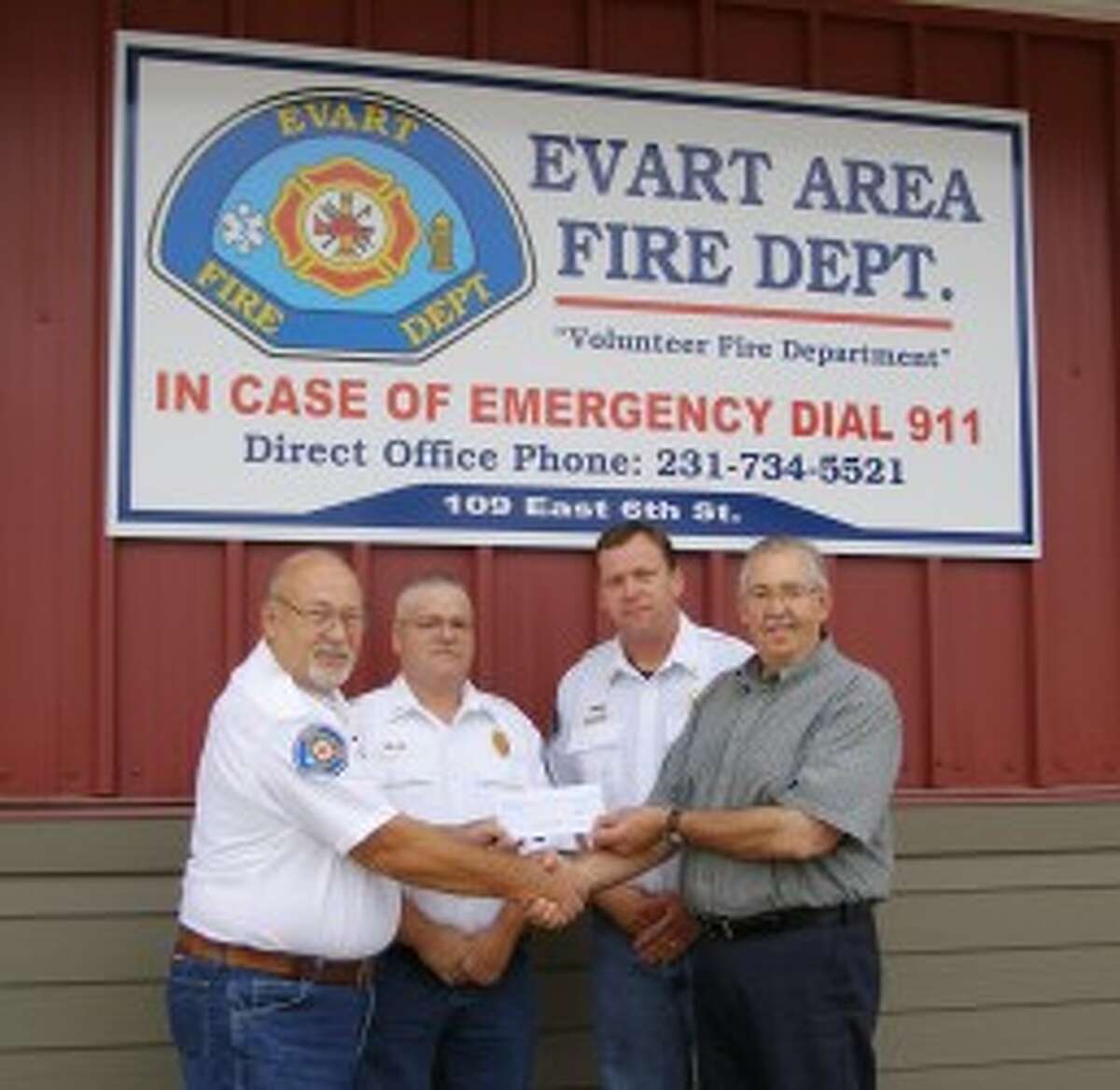 GRANTED FUNDS: The Evart Area Joint Fire Department received a $2,500 grant from FM Global to be used for pre-fire planning. Pictured (from left) is Evart Area Joint Fire Department Deputy Chief Ralph Carlson, Captain Jason Ackett, Assistant Chief Dan Kleeves and FM Global Representative John Lohmeyer. (Courtesy photo)