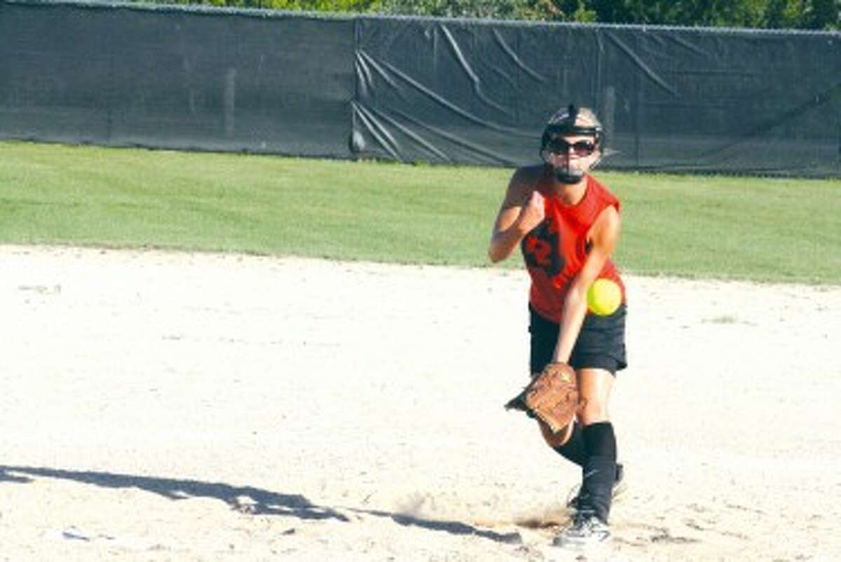COMING IN FAST: Hannah Price of Reed City delivers a pitch against Pine River. (Herald Review photo/John Raffel)