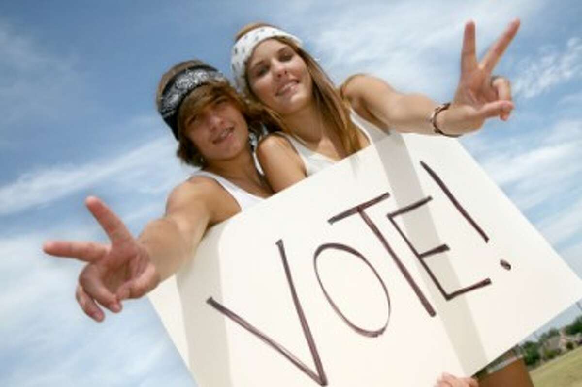 YOUNG VOTERS: New program allows college students who are unable to return home an opportunity to vote. (Courtesy photo)