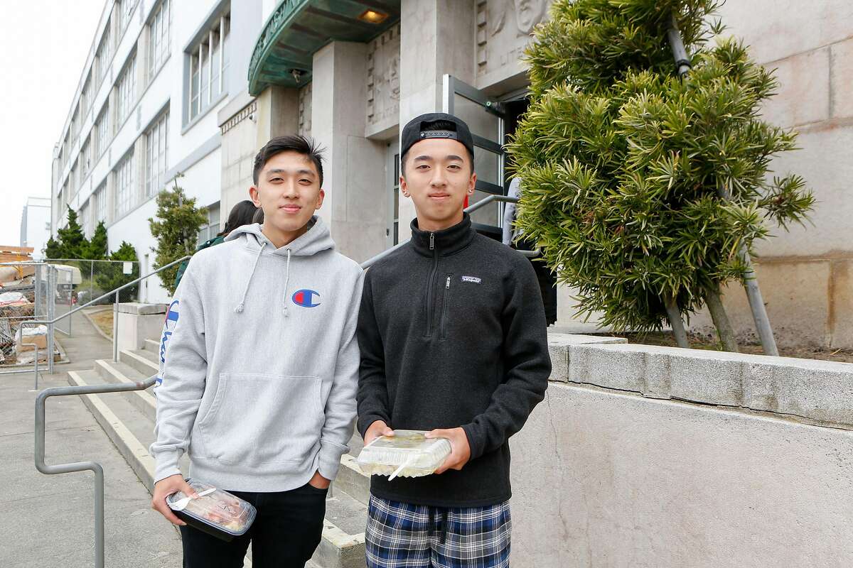 (L to R) Kevin Wong, 18, and Morrison Szeto, 19, stand for a portrait outside of George Washington High School on Monday, August 19, 2019 in San Francisco, Calif. Both friends are opposed to removing the controversial mural, "Life of Washington".