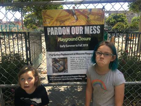 Poppy Allen, 9, (right) and Lincoln Allen, 7, at Moscone Recreation Center Playground in the Marina.