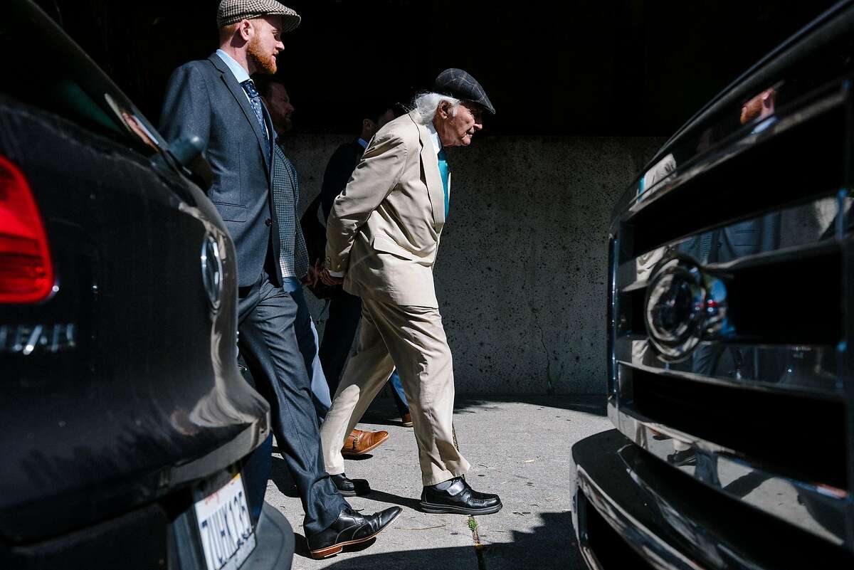 Defense lawyer Tony Serra, right, and his team leave the Alameda County Superior Courthouse in Oakland, Calif, on Monday, August 19, 2019. The presiding judge of the ongoing Ghost Ship trial dismissed three jurors over unspecified infractions, stalling the verdict, and sending replacement jurors back into deliberation.