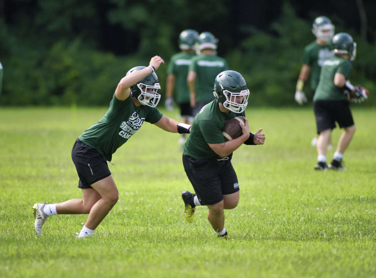 Shenendehowa High School varsity football players run through drills during practice on Monday, August 19, 2019, in Clifton Park, N.Y. (Paul Buckowski/Times Union)