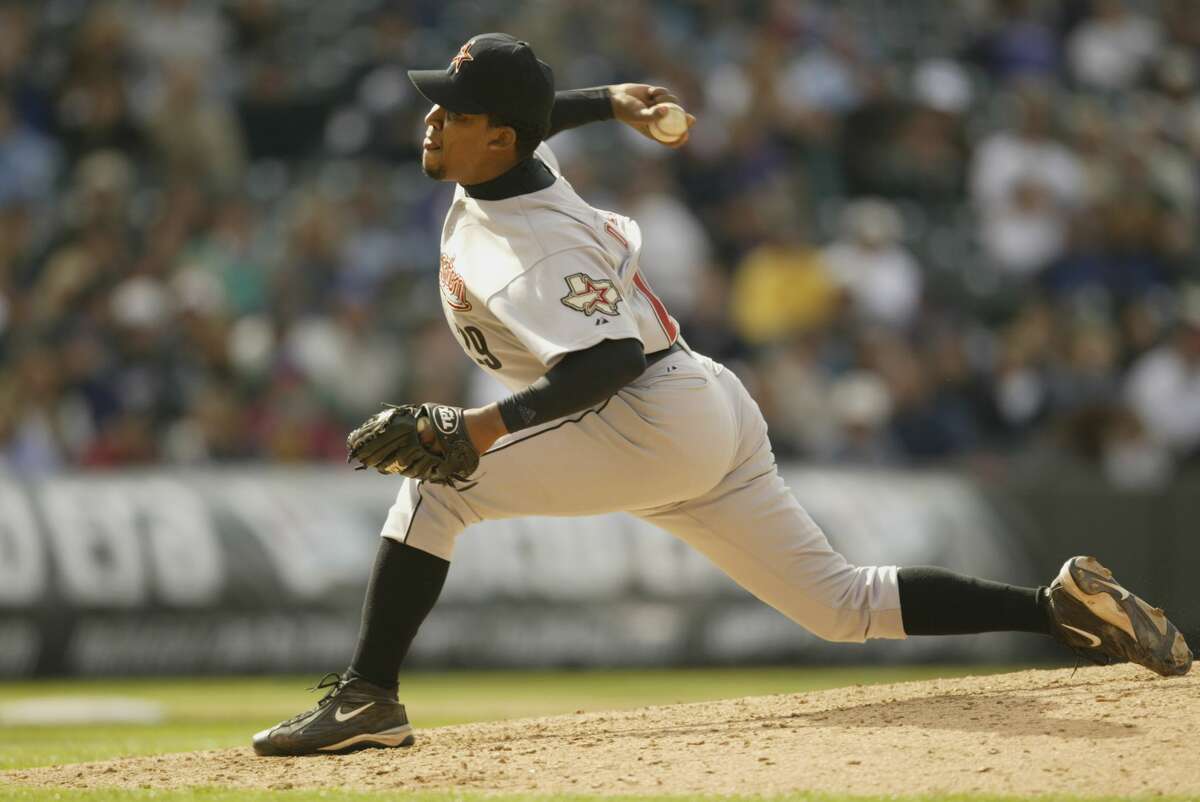 DENVER - APRIL 8: Octavio Dotel #29 of the Houston Astros pitches against the Colorado Rockies during the game at Coors Field in Denver, Colorado on April 8, 2002. The Rockies won 8-4. (Photo by Brian Bahr/Getty Images)
