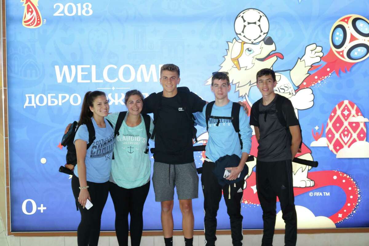 Carson Fitzner, center, a 2018 graduate of Middletown High School, runs the videotaping business Fitzner Productions. He’s shown here with fellow students last June on a trip to Russia to see the World Cup. Fitzner’s video so impressed the Eurasia Foundation of Washington, D.C., that it was selected as a top contest winner.