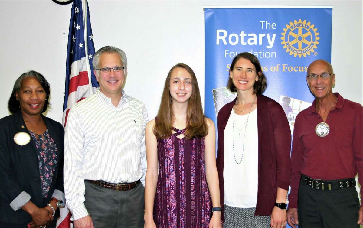 The Rotary Club of New Milford recently presented its May Student of the Month Award to Isabella Bianchi. Isabella is a member of the math, Spanish and national honor societies, has received the President’s Award for Educational Excellence, the Award for Achievement of Excellence in Principles of Engineering and took First Place in Lockheed Martin’s CodeQuest. She created a research project for the McCarthy Observatory with the goal of discovering new asteroids, comets and supernovae. Isabella volunteers at the observatory, tutors peers in math and ESL and is a counselor at Clatter Valley Day Camp. She plans to study engineering at Tufts University and pursue a career as an aerospace engineer to astrophysicist. Above are, from left to right, Rotarian Cheyrisse Boone, Isabella’s father, Gerard Bianchi, Isabella, NMHS science teacher Erin Lucia and Rotarian Tom McSherry.