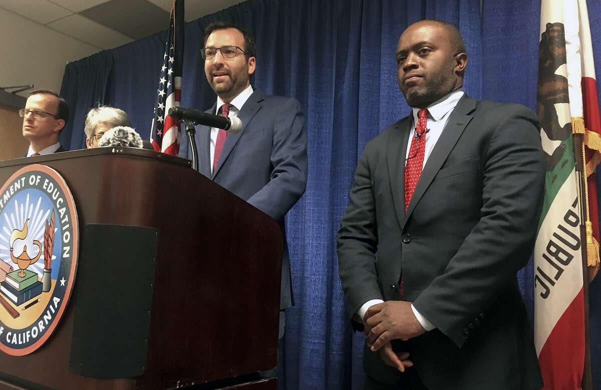 Democratic state Sen. Ben Allen of Santa Monica, center, speaks beside Superintendent Tony Thurmond, right, at a news conference Wednesday Aug. 14, 2019, in Sacramento, Calif. California's public education chief is seeking changes to what would be the nation's first statewide ethnic studies curriculum. State Superintendent Tony Thurmond said Wednesday that he will recommend amendments to better reflect the contributions of Jewish Americans while removing portions that the California Legislative Jewish Caucus found objectionable. (AP Photo/Don Thompson)