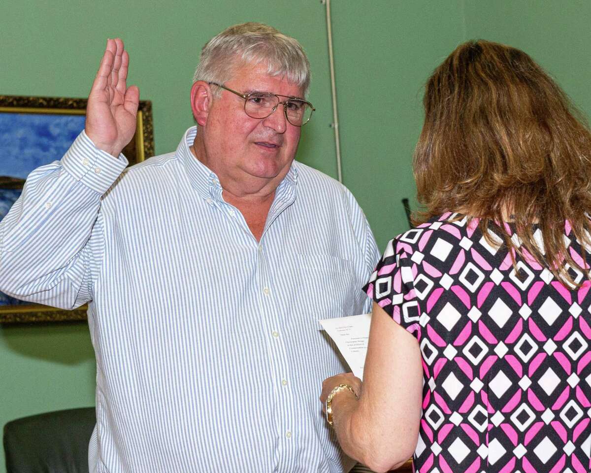 Mayor Chris Briggs, the former Common Council president, is sworn in after a vote to remove Mayor Shawn Morse from office on Tuesday, Aug. 20, 2019 at Cohoes City Hall (Jim Franco/Special to the Times Union.)