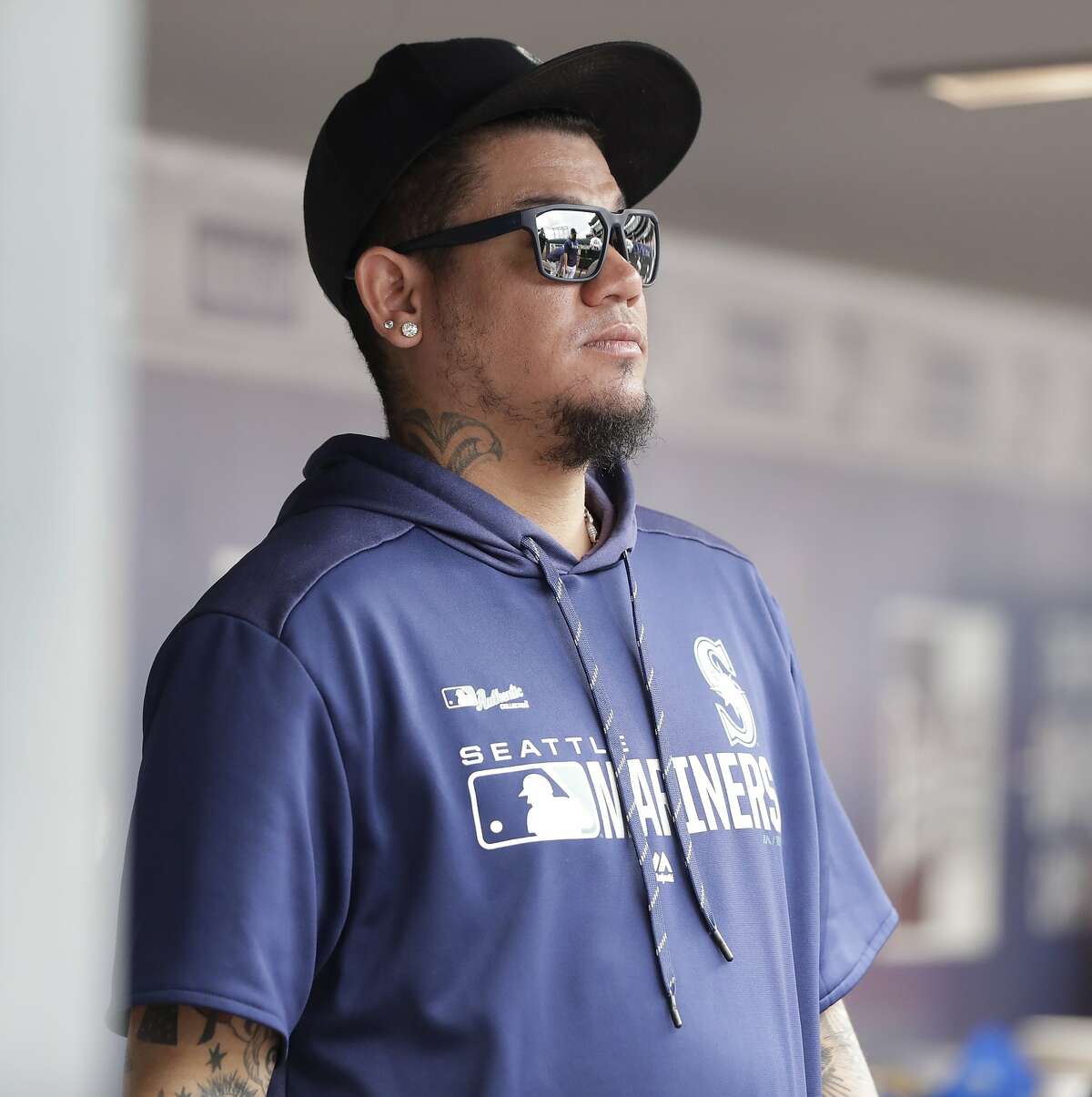 Seattle Mariners pitcher Felix Hernandez stands in the dugout during a baseball game against the Detroit Tigers, Saturday, July 27, 2019, in Seattle. (AP Photo/Ted S. Warren)