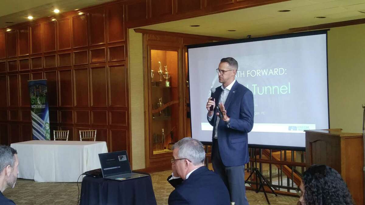 Brian Gettinger, engineer and tunneling services lead with engineering consulting firm Freese and Nichols, gives a presentation during the Houston Northwest Chamber of Commerce Community Luncheon on Aug. 15.