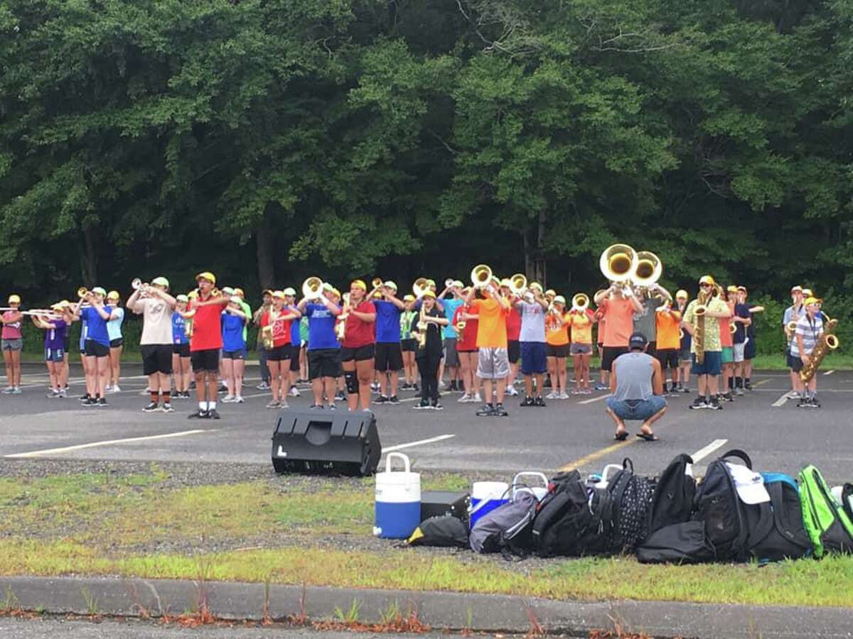 The Trumbull High School Golden Eagle Marching Band's 46th season welcomes musicians, percussionists, color guard, and drum majors back to band camp to learn their 2019 fall show ‘Toxic.’