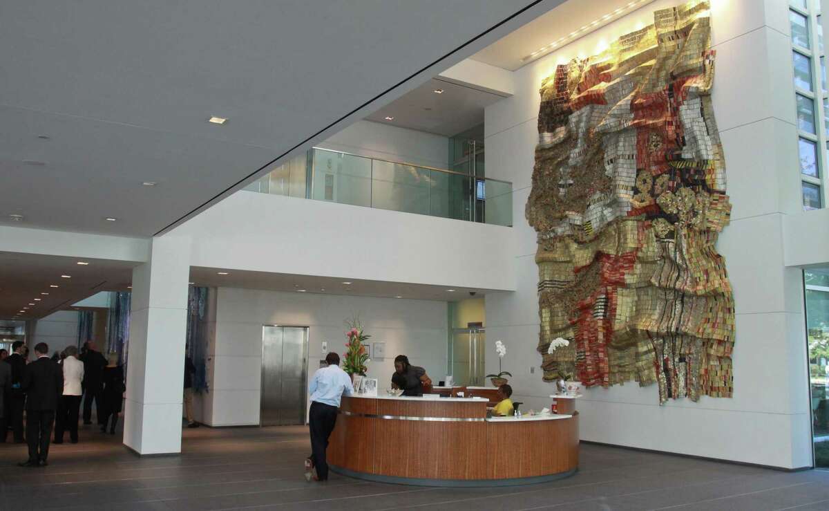 (For the Chronicle/Gary Fountain, March 5, 2013) Art "Wrinkle of the Earth 2," by El Anatsui in the reception area of ConocoPhillips.