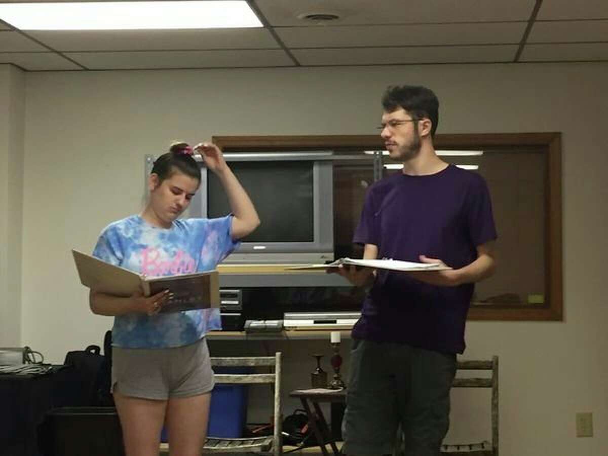 Taylor Winslow as Laertes and Walker Wenzel as Claudius rehearse a scene from "Hamlet." (Victoria Ritter/vritter@mdn.net)