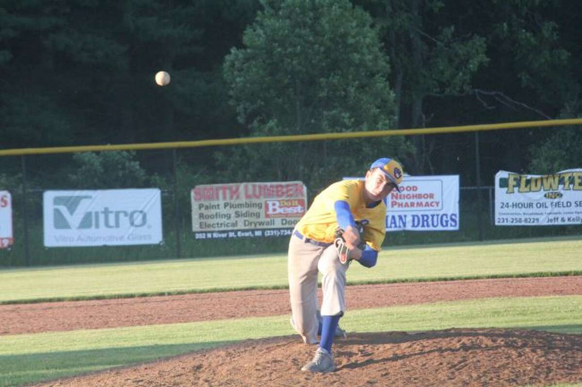 Donovin Duncan fires a pitch for Evart.
