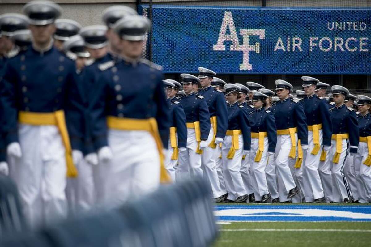 FILE - In this May 30, 2019 file photo, Air Force Cadets arrive at the 2019 United States Air Force Academy Graduation Ceremony at Falcon Stadium at the United States Air Force Academy, in Colorado Springs, Colo. An analysis released Tuesday, July 23, 2019, shows the percentage of female students nominated by members of Congress for admission to U.S. service academies has been rising although men are still put forward at numbers nearly three times higher than women. (AP Photo/Andrew Harnik, File)