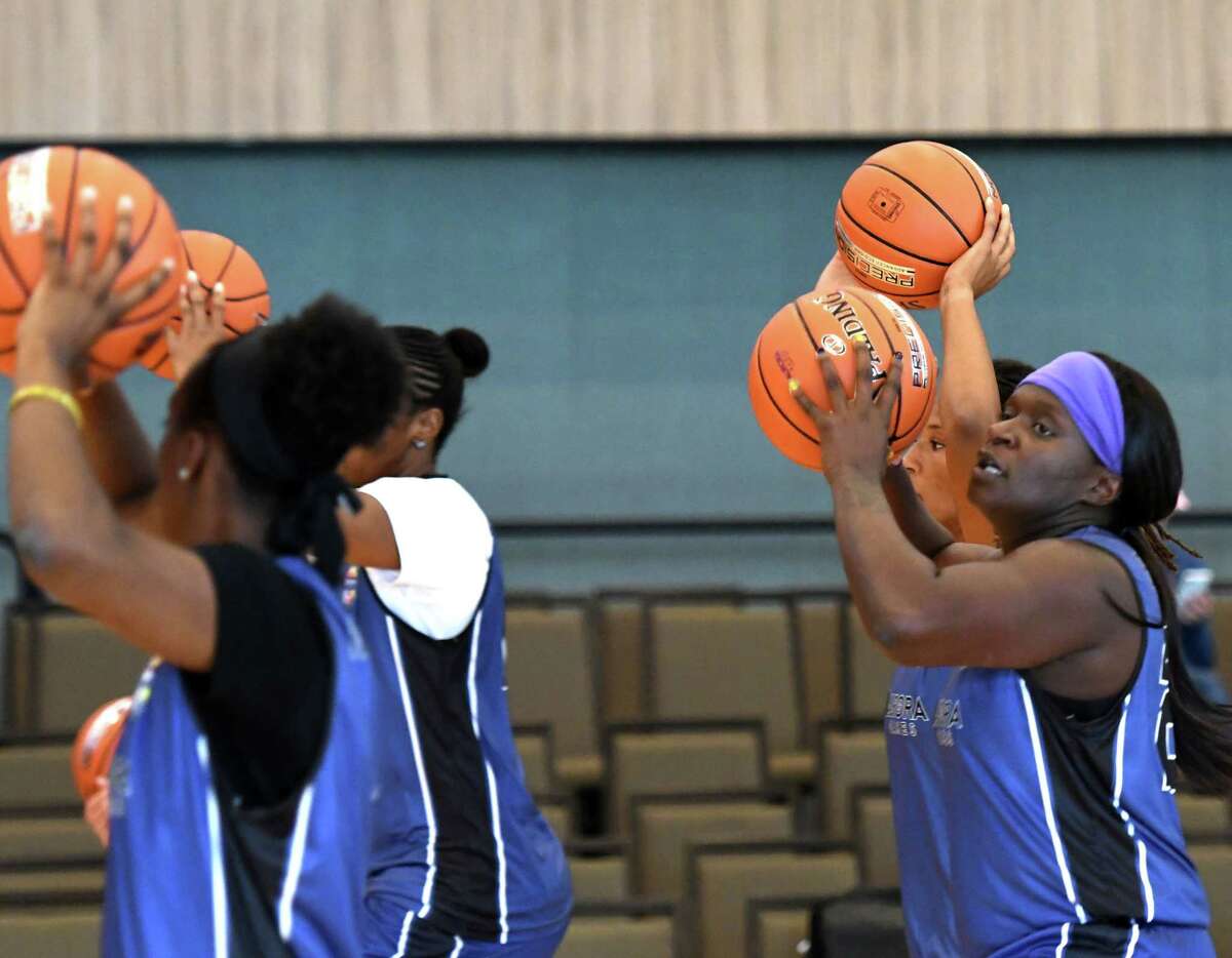 Former WNBA player Barbara Turner, right, works out with her Team Americas basketball squad teammates during practice for the Aurora Games on Wednesday, Aug. 21, 2019, at the Capital Center in Albany, N.Y. (Will Waldron/Times Union)