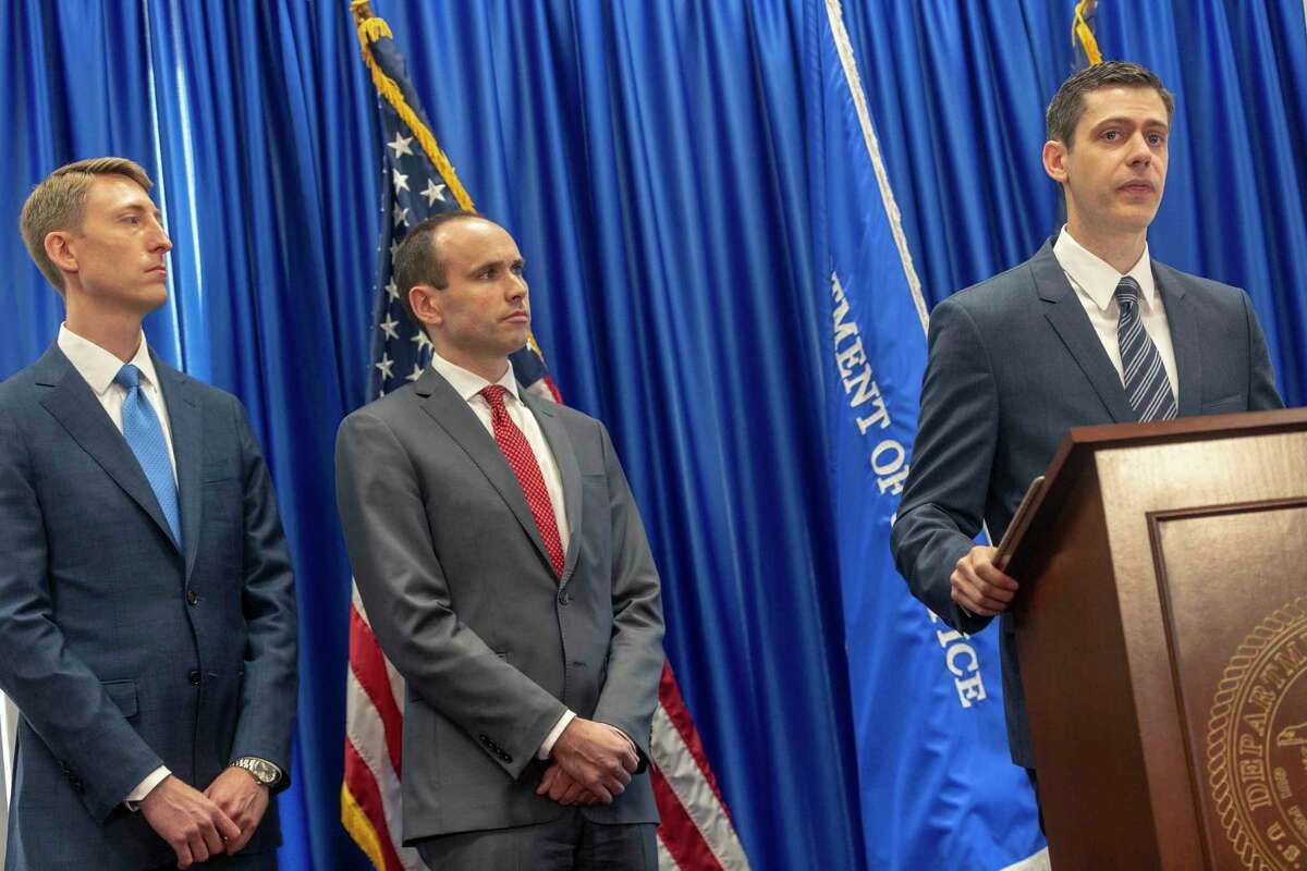 John F. Bash, right, U.S. Attorney for the Western District of Texas, speaks Wednesday, Aug. 21, 2019 about the arrest of five people for allegedly stealing millions of dollars from elderly and disabled veterans in a scheme that used stolen identity information to access Department of Defense and Veteran Affairs benefit websites. Gus Eyler, left, Director of the Department of Justice Consumer Protection Branch, and David Morrell, center, Deputy Assistant Attorney General of the DOJ Consumer Protection Branch also spoke during the press conference.