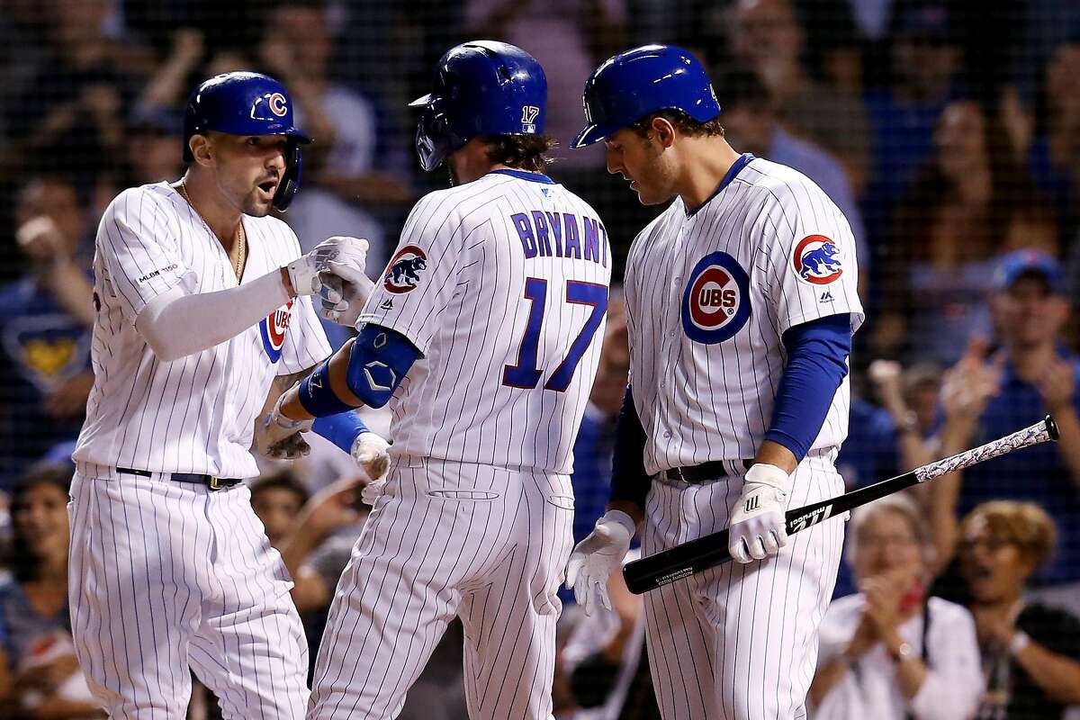 Chicago Cubs Kris Bryant celebrates with Anthony Rizzo (44) after