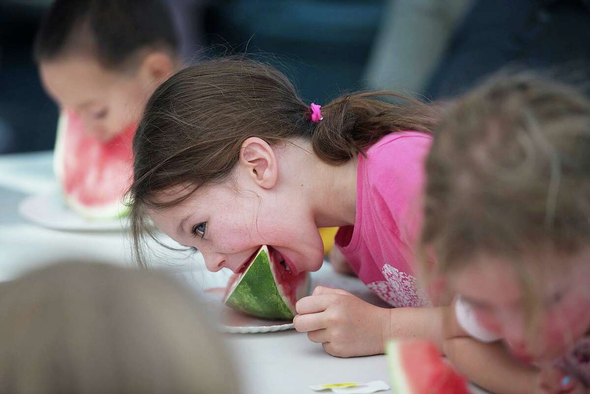 Watermelon eating contest at the Cannon Grange Fair in Wilton in 2017. The contest would not have been held this year in light of social distancing measures. The fair is being held virtually this year.