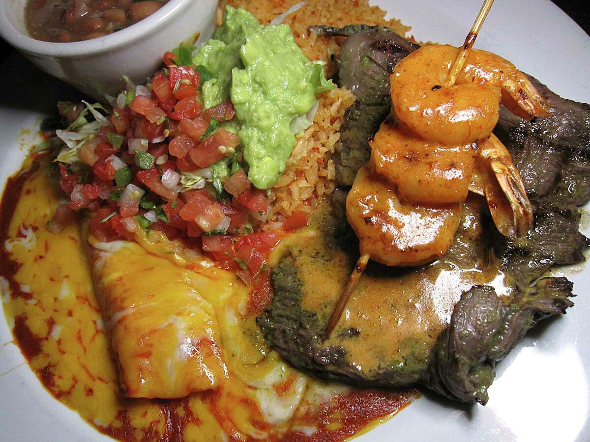 Arachera Marisol is a grilled skirt steak with shrimp, crema de chipotle, rice, borracho beans and a cheese enchilada at Aldaco's Mexican Cuisine.